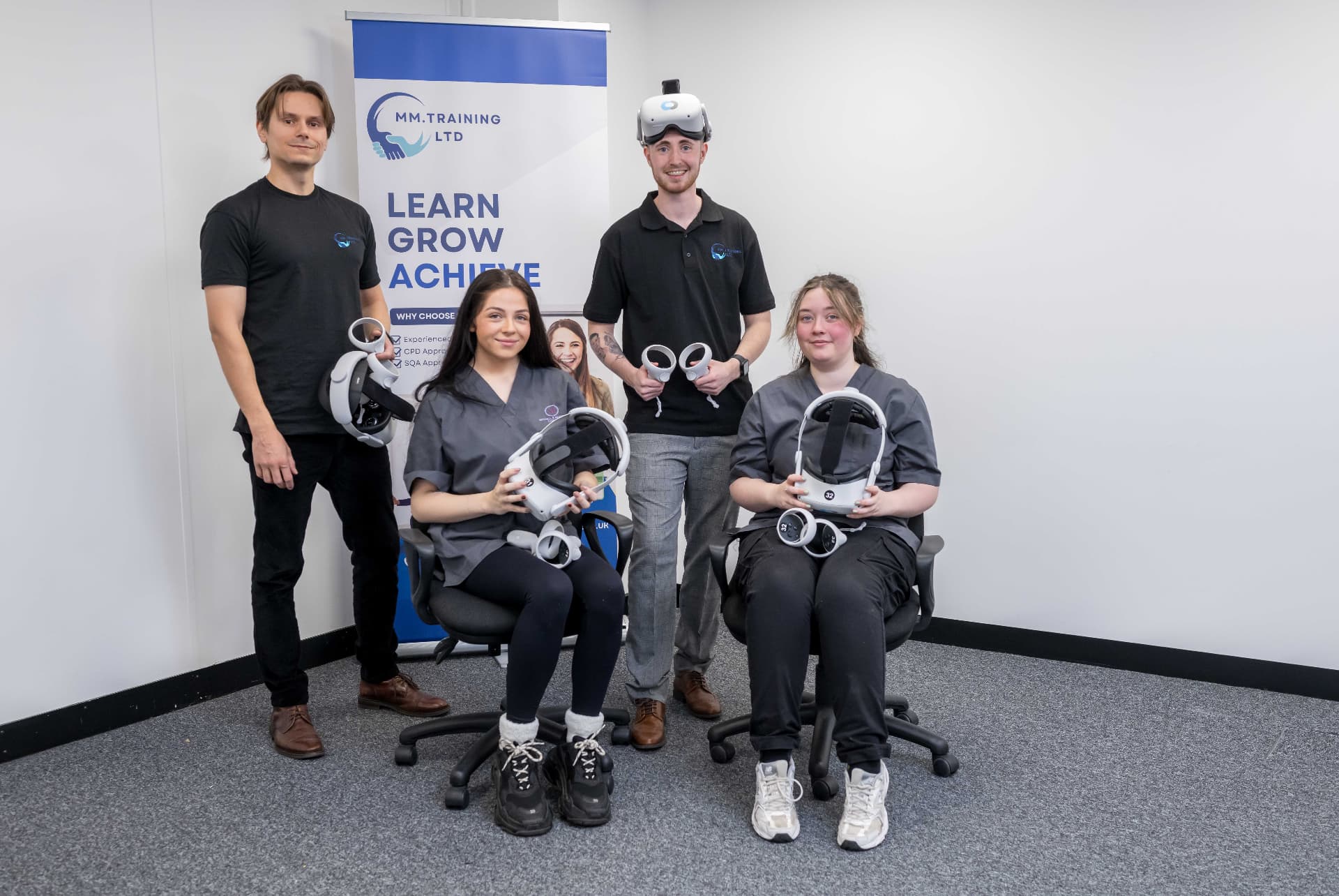 The MMTraining team with VR headsets used for dementia training